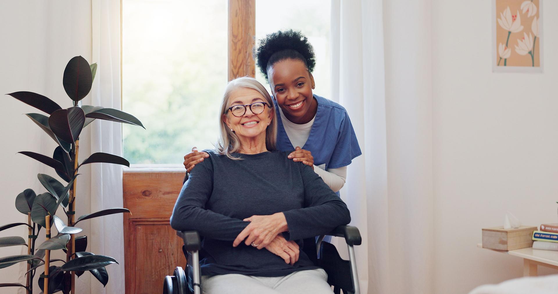caregiver providing compassionate in-home care and companionship to senior woman in wheelchair in Port Charlotte Florida