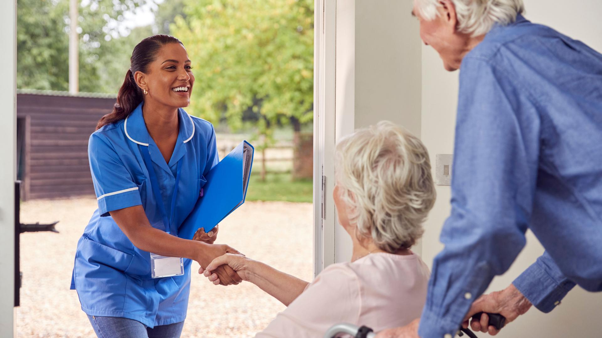 nurse greeting senior woman at home for in-home care visit in Port Charlotte Florida