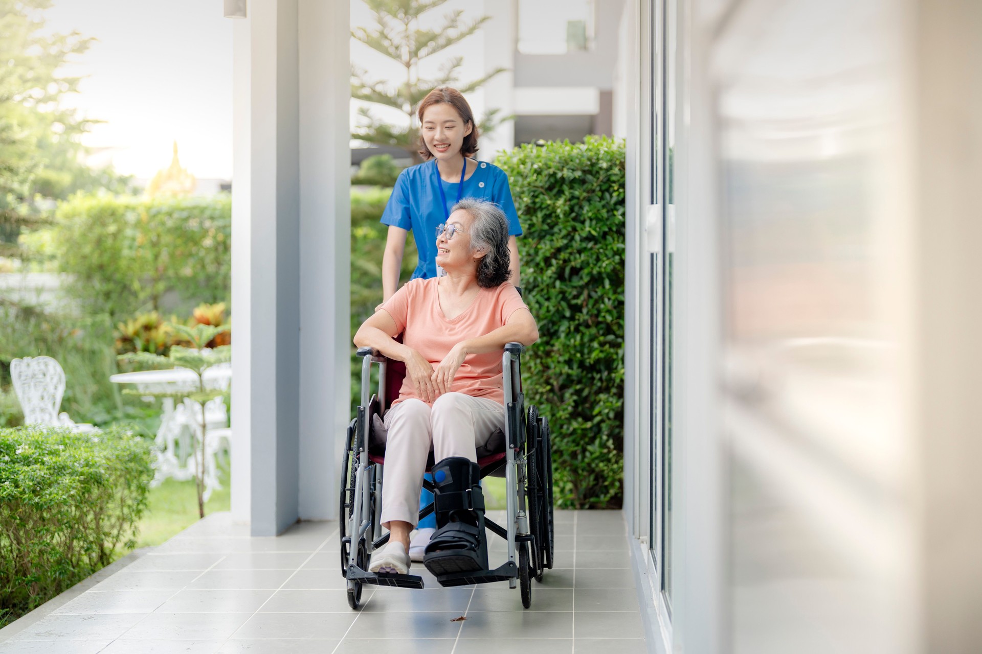 Port Charlotte skilled nursing nurse assisting elderly patient with mobility at home