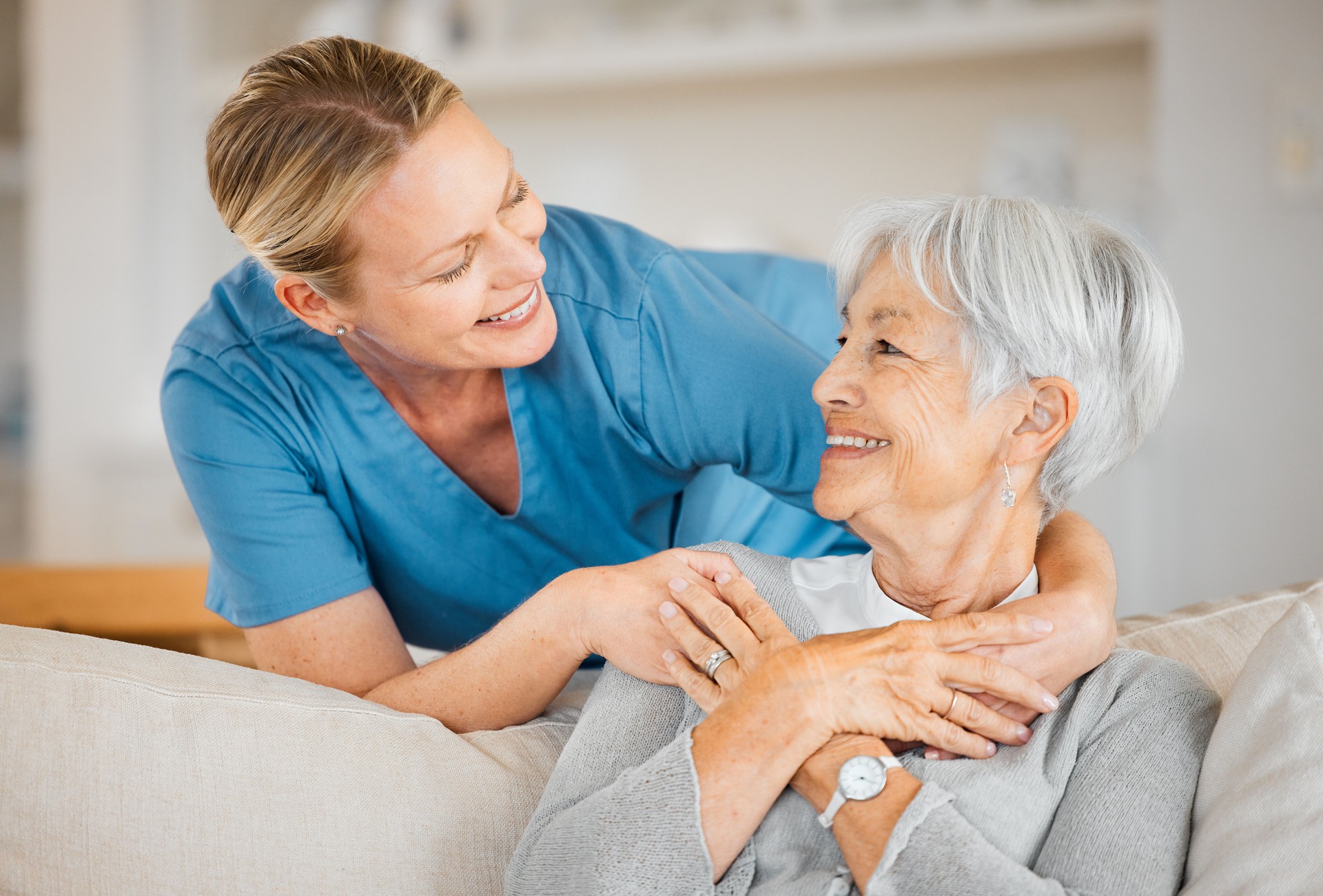 caregiver assisting elderly woman with personal care and hygiene at home in Port Charlotte Florida